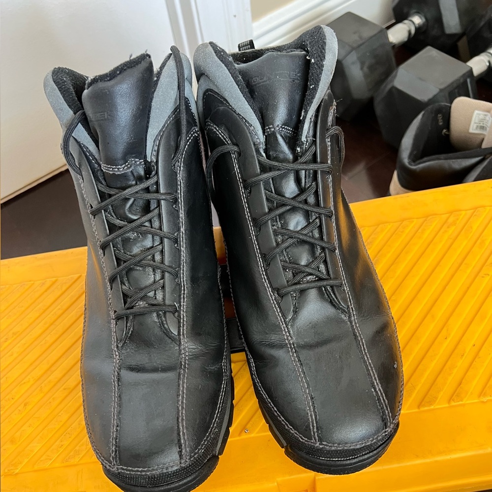 Men’s waterproof boots. Leather upper, rubber bottoms and lower sides of boots